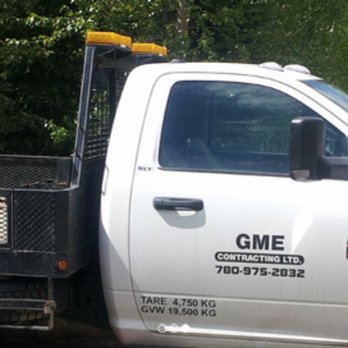 GME Contracting - a white truck parked in a lot - General Contractors Near Me - Parkland County, Alberta