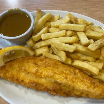 Laughing Halibut - Cod n chips n curry sauce. - Fish & Chips Near Me - London, XGL Laughing Halibut - Cod n chips n curry sauce. - Fish & Chips Near Me - London, XGL