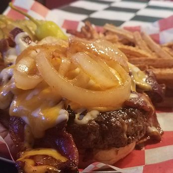 Coyote Bluff Cafe - Bacon cheeseburger.  1/2 pound patty, bacon, cheese, grilled onions, etc. with fries. - Burgers Near Me - Amarillo, Texas