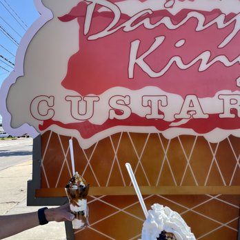 Dairy King - a hand holding a scoop of ice cream - Ice Cream & Frozen Yogurt Near Me - Independence, Ohio Dairy King - a hand holding a scoop of ice cream - Ice Cream & Frozen Yogurt Near Me - Independence, Ohio