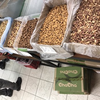 Hye Market & Deli - a man picking nuts - Grocery Near Me - Glendale, California Hye Market & Deli - a man picking nuts - Grocery Near Me - Glendale, California