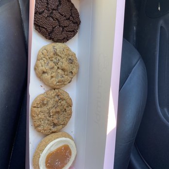 Crumbl - Fenton - 4 Cookies Choc chip, oatmeal choc chip, chocolate crinkle, salted caramel cheesecake. - Bakeries Near Me - Fenton, Michigan Crumbl - Fenton - 4 Cookies Choc chip, oatmeal choc chip, chocolate crinkle, salted caramel cheesecake. - Bakeries Near Me - Fenton, Michigan
