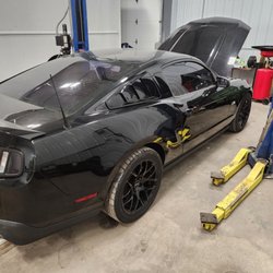 One Stop Auto Repair and Customz - checking everything over