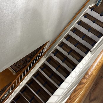 JM Flooring and Accents - Vinyl stairs with white risers - Flooring Near Me