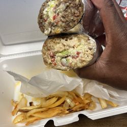 Chicken Burrito on the bottom. Steak on the top