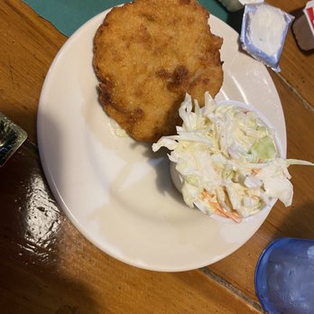 Mulligan's - One of the homemade clam cakes with coleslaw - American Near Me - Biddeford, Maine