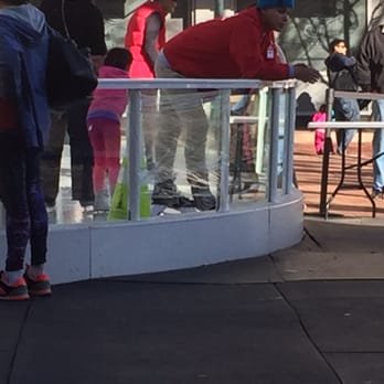 Reston Town Center Ice Rink - Missing glass on their retaining wall, no problem let's use some plastic wrap and that should fix that problem. - Skating Rinks Near Me - Reston, Virginia Reston Town Center Ice Rink - Missing glass on their retaining wall, no problem let's use some plastic wrap and that should fix that problem. - Skating Rinks Near Me - Reston, Virginia