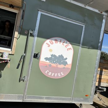 Jubilee Coffee - a green food truck with a logo on the side - Coffee & Tea Near Me - Olmos Park, Texas
