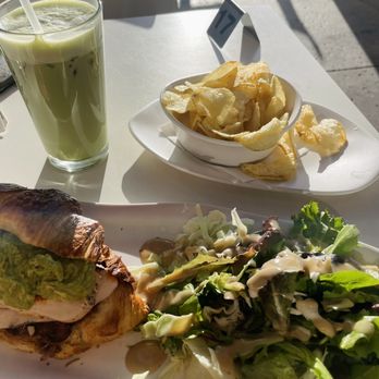 Baguette Cafe - Matcha Latte, Chicken pesto on croissant, side salad and chips - Breakfast & Brunch Near Me - Henderson, Nevada