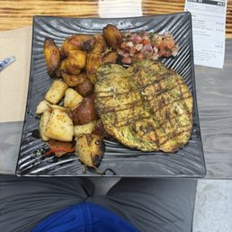Grilled Cilantro chicken with red potatoes and fried plantains. Grilled Cilantro chicken with red potatoes and fried plantains.
