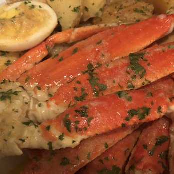 Crab Craze - a plate of crab legs and potatoes - Seafood Near Me - Winter Haven, Florida