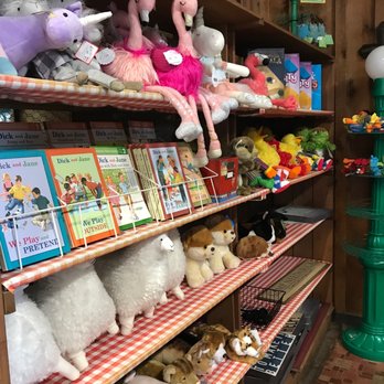 Oakridge - a shelf of stuffed animals in a store - Smokehouse Near Me - Schulenburg, Texas