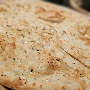 Karahi Boys - Garlic naan. Necessary to mop up the karahi sauce. - Pakistani Near Me - Sugar Land, Texas Karahi Boys - Garlic naan. Necessary to mop up the karahi sauce. - Pakistani Near Me - Sugar Land, Texas