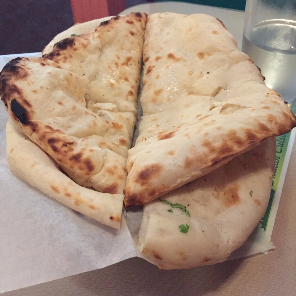 Moti Mahal - Garlic and cheese naan. Look how thick and yummy. - Indian Near Me - Kansas City, Missouri Moti Mahal - Garlic and cheese naan. Look how thick and yummy. - Indian Near Me - Kansas City, Missouri