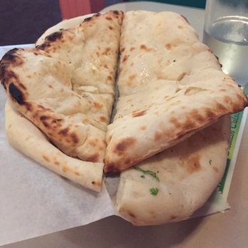 Moti Mahal - Garlic and cheese naan. Look how thick and yummy. - Indian Near Me - Kansas City, Missouri