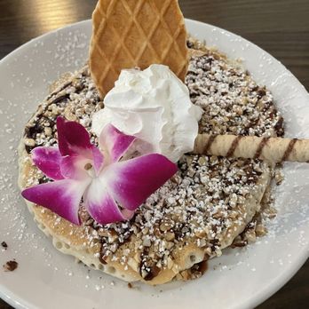 The Mill - Chocolate hazelnut pancake with toasted hazelnuts on top - Breakfast & Brunch Near Me - Mansfield, Texas The Mill - Chocolate hazelnut pancake with toasted hazelnuts on top - Breakfast & Brunch Near Me - Mansfield, Texas