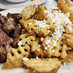 Nikos Gyros - Lamb Souvlaki, asked for rice but got fries w/feta. Took most home. ($22, 4/21/23)