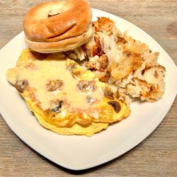 Mushroom & Swiss Omelette with hash browns and a plain bagel.