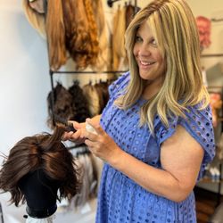 b.LUXE Hair and Makeup Studio - BLUXE Owner, Heather Cohen working on a custom wig as a Hair-Loss Solutions Specialist