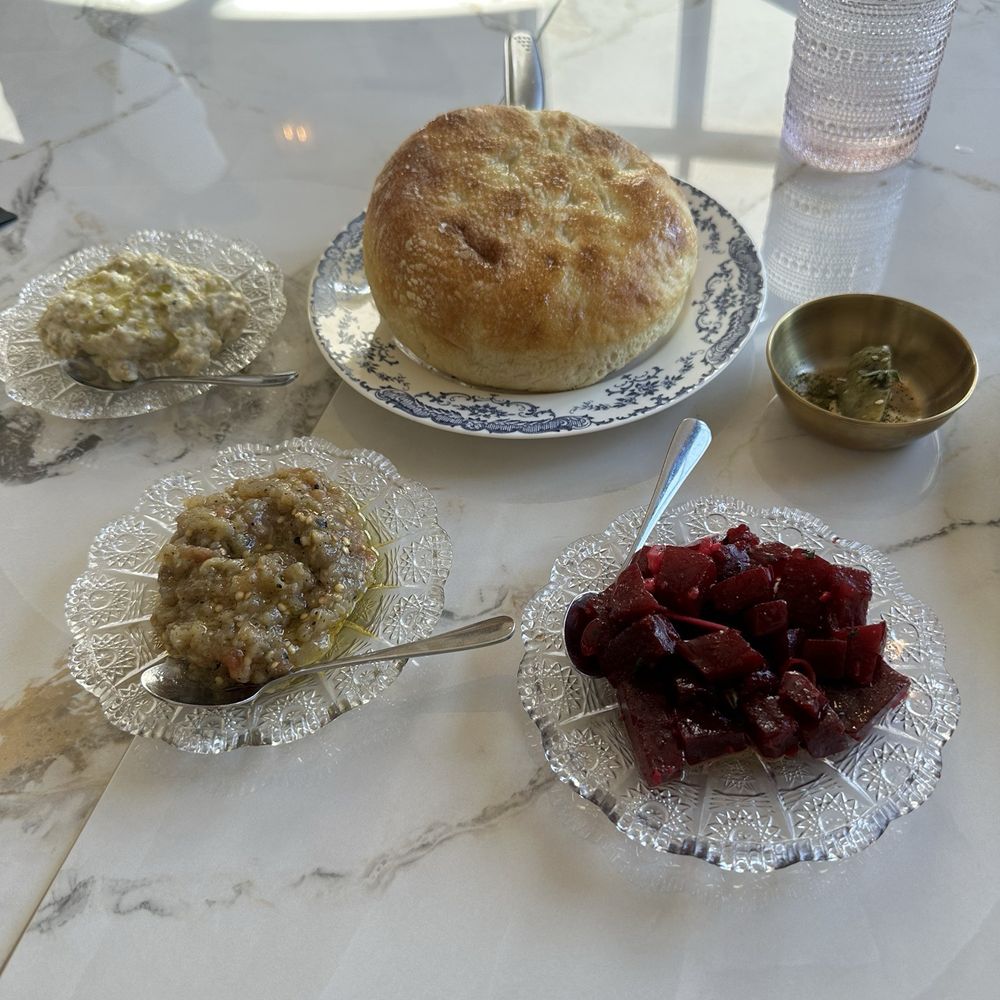Lunch mini mezze added for free to entrees .. bread is incredible Lunch mini mezze added for free to entrees .. bread is incredible