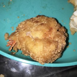 Terrible shrimp ball that had tail attached inside batter.  Also have all photos of responses by owner on other media outlets