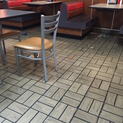 Carl's Jr - Whoa, only people here & there's still this mess. Our order also took 12 min to get. They needa step up their game...