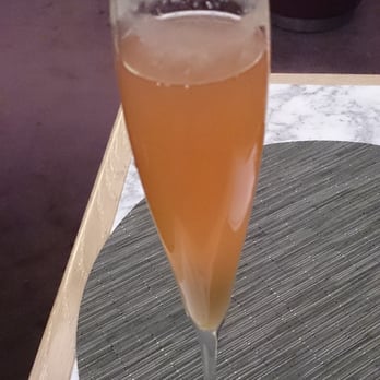 Searcys Champagne Bar - Peach Bellini, £6.75+. - Champagne Bars Near Me - London, XGL Searcys Champagne Bar - Peach Bellini, £6.75+. - Champagne Bars Near Me - London, XGL