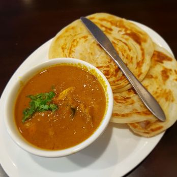 Dosa Corner - Roti. You can chose vegetarian or non vegetarian gravy. - Indian Near Me - Vancouver, British Columbia