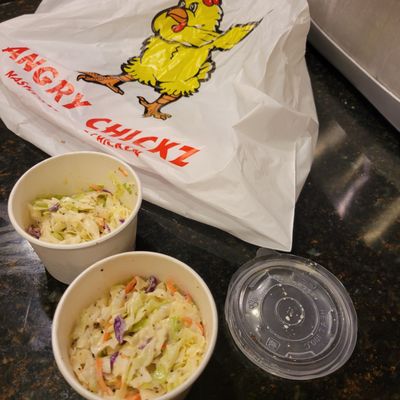 Photo of Angry Chickz - Brentwood, CA, US. They didn't even bother to fill the containers barely halfway for $4 per side. Ridiculous!