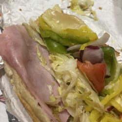Excellent Pizza - Italian with rotten lettuce only a piece of ham and salami in my sandwich