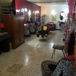 Salon Atmosphere Style - This is a picture of our kids room. We do kids cut, diva styles, and birthday parties in this fun room.