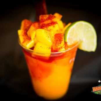 Mangolandia - a drink with a slice of lime - Ice Cream & Frozen Yogurt Near Me - Houston, Texas Mangolandia - a drink with a slice of lime - Ice Cream & Frozen Yogurt Near Me - Houston, Texas