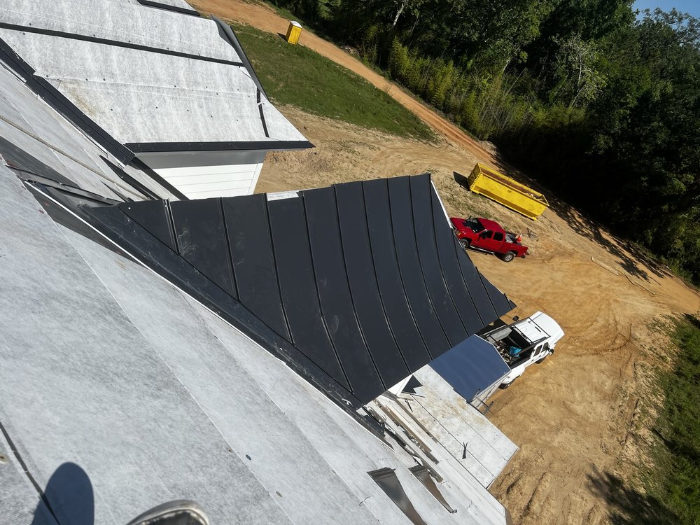 Slide of Caballeros Roofing