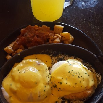 Mash'D - Eggs Benedict with house potatoes,  and my huge mason jar of mimosa - New American Near Me - San Antonio, Texas