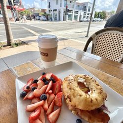 Balboa Lily's - Bagel Sandwich on onion bagel (I kept the tomato & spinach off)! Delicious, & with Side of berries!