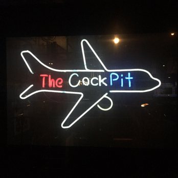 The Cockpit - a neon sign of an airplane - Lounges Near Me - Dallas, Texas The Cockpit - a neon sign of an airplane - Lounges Near Me - Dallas, Texas