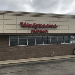 the front of a walgreens pharmacy the front of a walgreens pharmacy