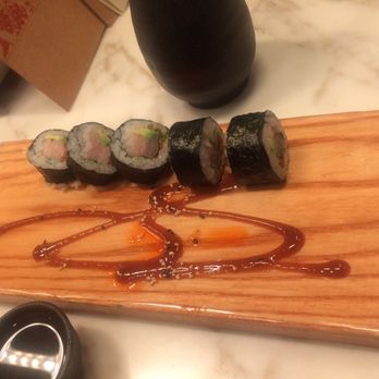 Uchi Dallas - The Zero Sen roll with yellow tail, shallots, avocado and cilantro. - Japanese Near Me - Dallas, Texas Uchi Dallas - The Zero Sen roll with yellow tail, shallots, avocado and cilantro. - Japanese Near Me - Dallas, Texas