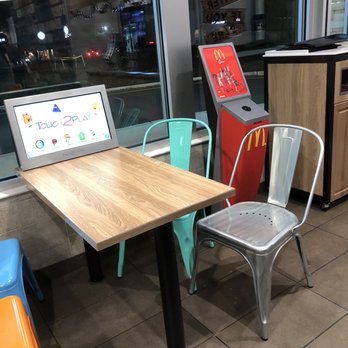 McDonald's - a table and chairs in a restaurant - Fast Food Near Me - Aberdeen, New Jersey