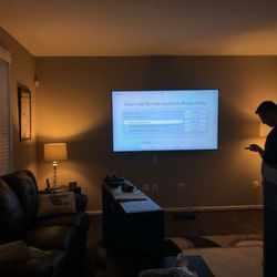 JD Integrations - 85" TV wall mounted with in wall power and HDMI