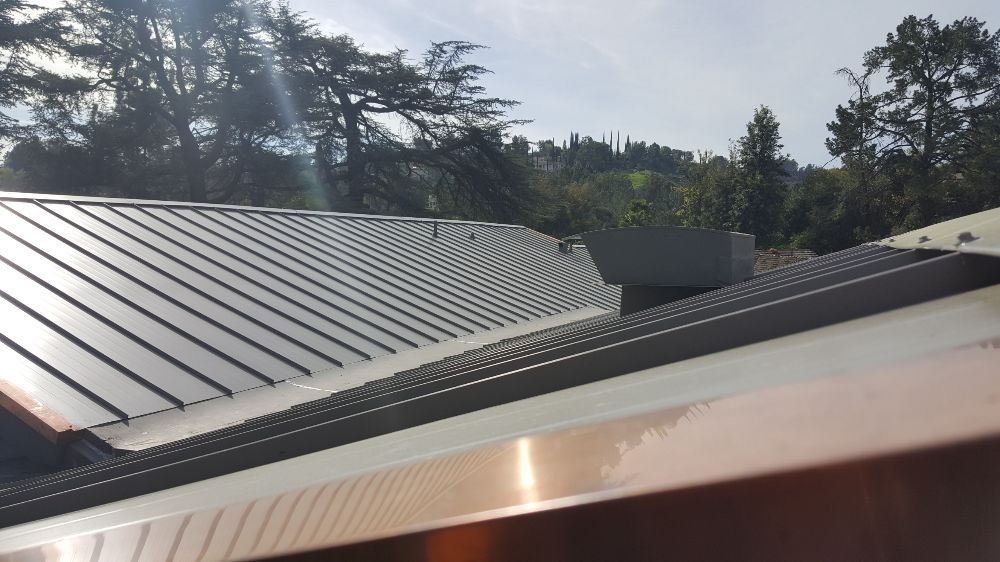 Slide of Immaculate Roofing