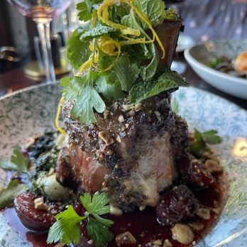 Fire & the Feast - Braised pork shank - Italian Near Me - Edmonds, Washington