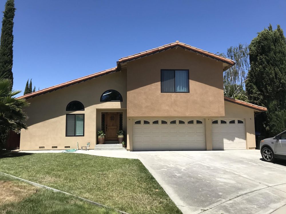 Slide of Umbrella Plastering & Roofing