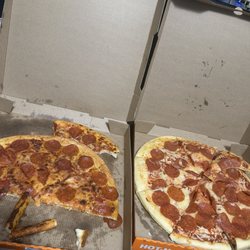 Little Caesar's Pizza - The pizza on the left is a old pizza while the pizza on the right is an uncooked pizza smh very disappointed