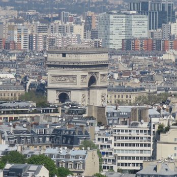 La Tour Eiffel - The l'arc de Triomphe looks almost small tucked in between the buildings. - Landmarks & Historical Buildings Near Me - Paris, 75