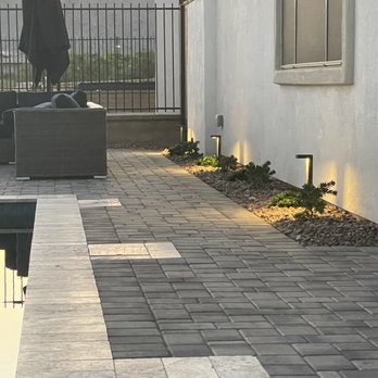 Four Sons Landscaping - Exceptional job of lining the pavers up for a great design against the pool coping - Landscaping Near Me Four Sons Landscaping - Exceptional job of lining the pavers up for a great design against the pool coping - Landscaping Near Me