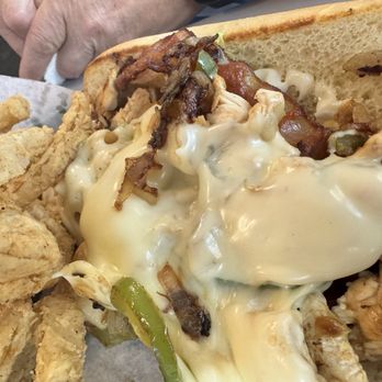 Grover's Fingers & Wings - Chicken Philly Supreme Sandwich with onion rings - Southern Near Me - Pensacola, Florida Grover's Fingers & Wings - Chicken Philly Supreme Sandwich with onion rings - Southern Near Me - Pensacola, Florida