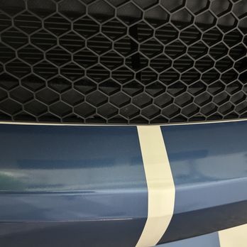 Superior Body Shop - Stripes don't line properly from edge of the grill and end of stripes, the white should be showing evenly and not offset. - Body Shops Near Me - San Carlos, California