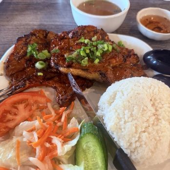 Pho Minh - Always a fav item of mine - A Vietnamese meal featuring grilled meat topped with green onions, served with rice, fresh vegetables, and a bowl of broth. - Soup Near Me - Temecula, California