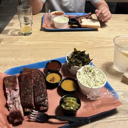 Blue Dog Craft Barbecue - Rib Plate ( sans bread) Collard Greens, Coleslaw, house made pickles and all the sauces